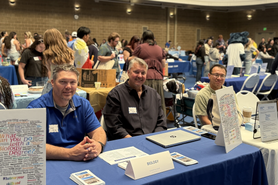 Faculty Members tabling at event