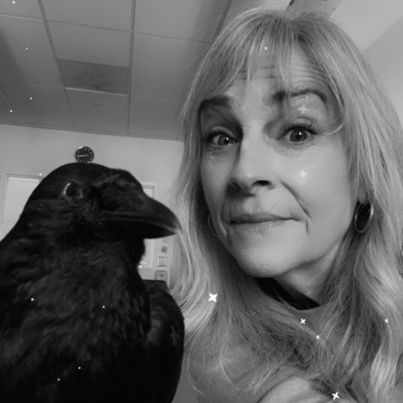 Picture of a crow and a woman