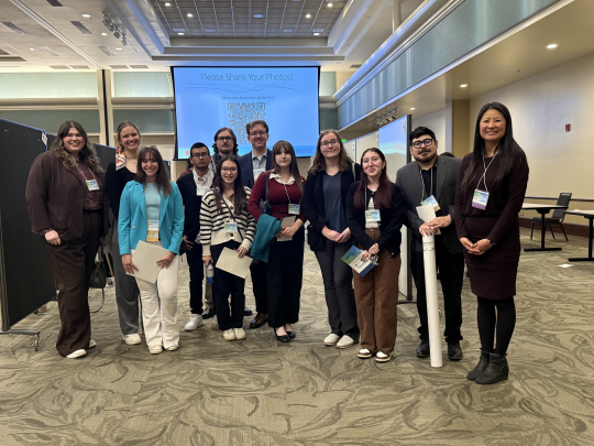Students and faculty at symposium event