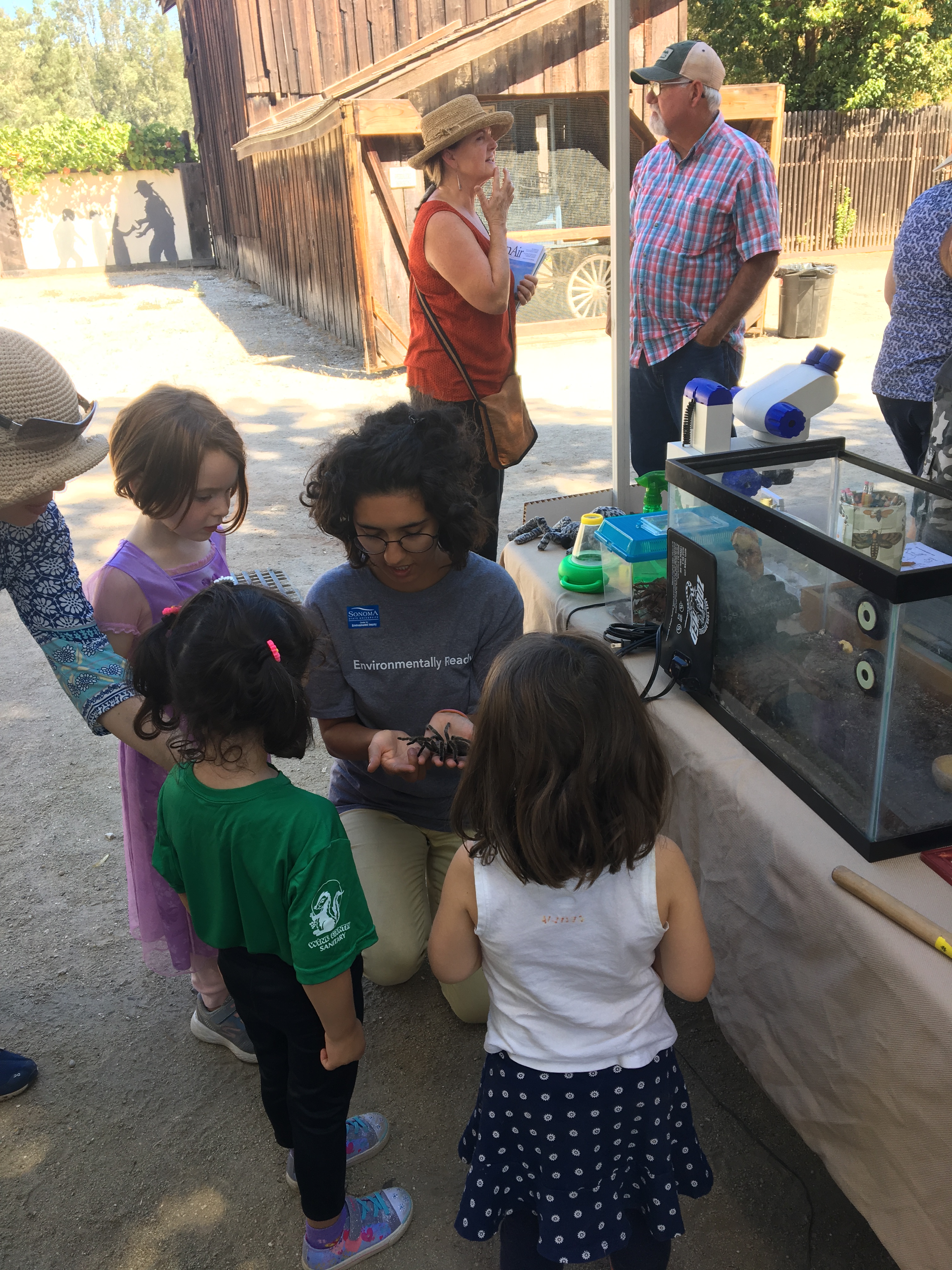 Nicolette showing Rosie the Spider to students