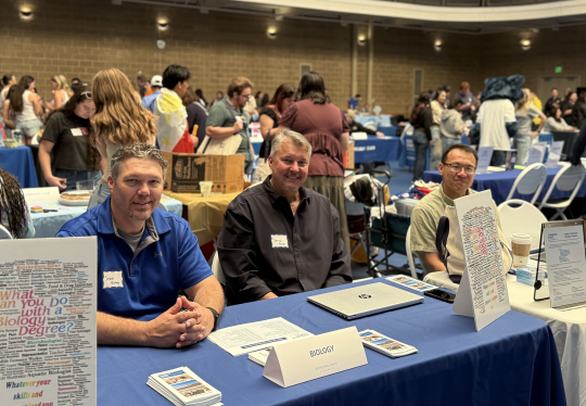 Faculty Members tabling at event